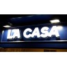 Enseigne La CASA logo lumineux en Plexiglass chants et face avant Enseigne La CASA logo lumineux en Plexiglass chants et face avant